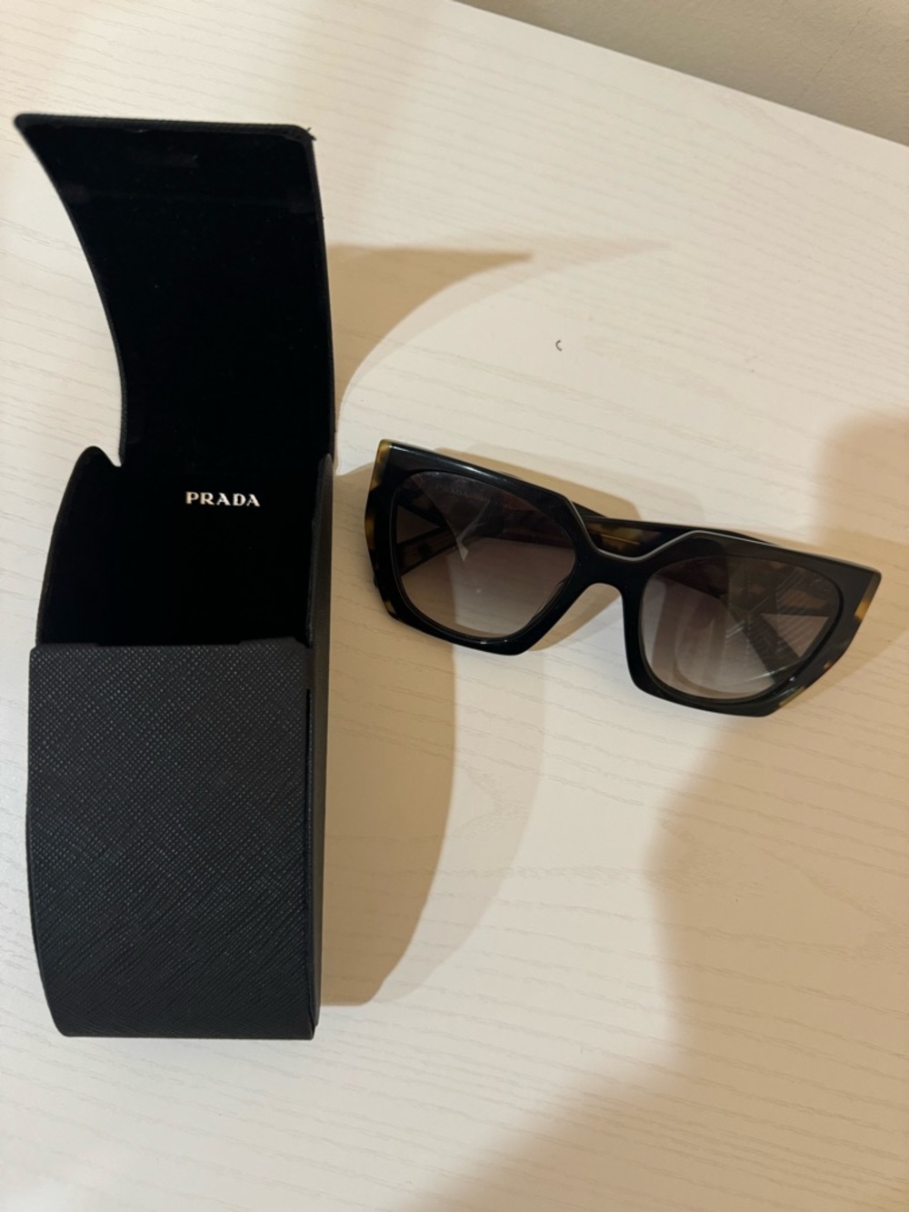 Prada Black Oversized Cat-Eye Sunglasses with Gradient Lenses